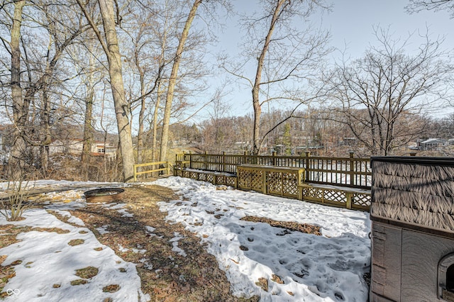 view of snow covered deck