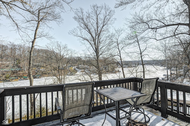 view of snow covered deck