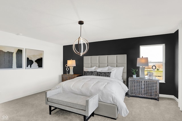 bedroom featuring light colored carpet