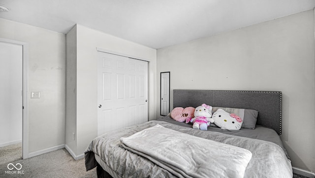 bedroom with light colored carpet