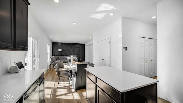 kitchen featuring a center island and light hardwood / wood-style floors