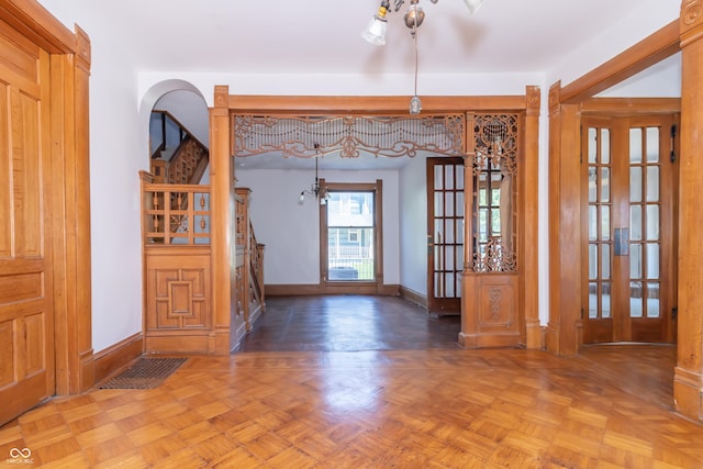 entrance foyer with dark parquet floors