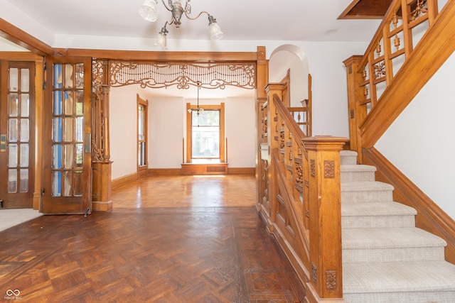 staircase with parquet flooring