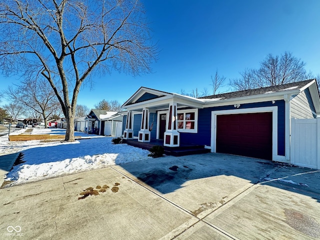 single story home featuring a garage