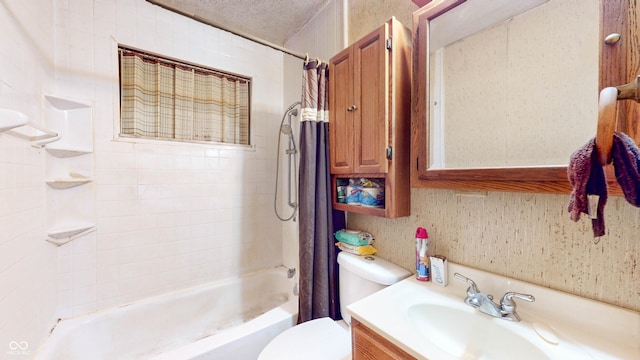 full bathroom with vanity, shower / bath combination with curtain, a textured ceiling, and toilet