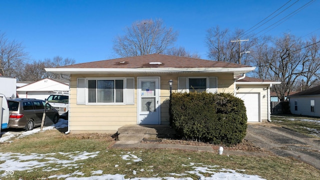 bungalow-style home featuring a garage