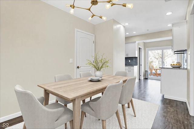 dining room with baseboards, dark wood-type flooring, and recessed lighting