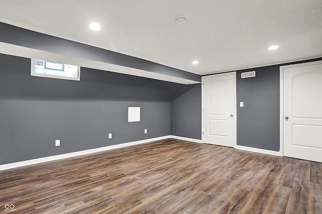 additional living space featuring recessed lighting, wood finished floors, visible vents, and baseboards