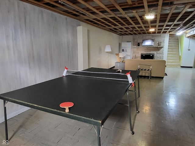 playroom featuring a fireplace