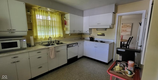 kitchen featuring white cabinetry, white appliances, and sink