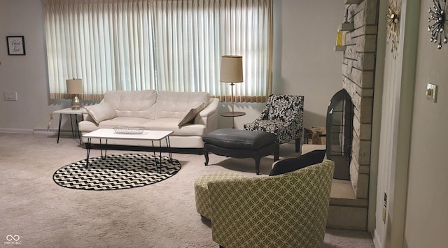 living room featuring a baseboard radiator and carpet