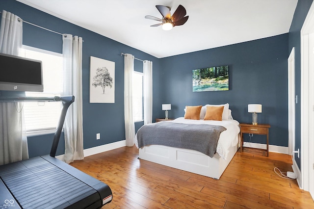 bedroom featuring ceiling fan and wood-type flooring