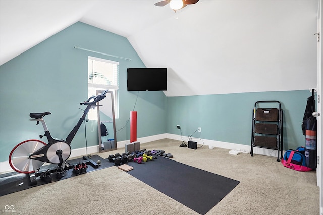 exercise area featuring lofted ceiling, ceiling fan, and carpet