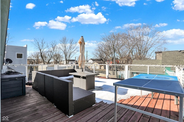 wooden deck with outdoor lounge area