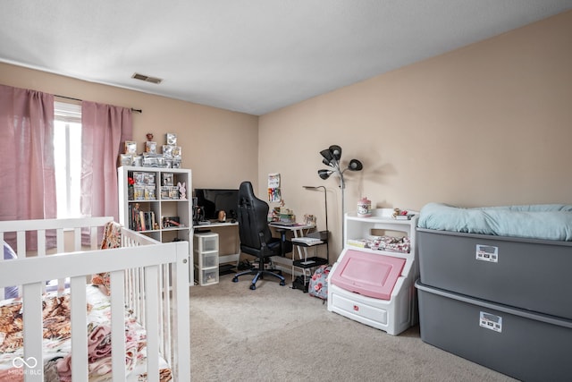 bedroom featuring carpet