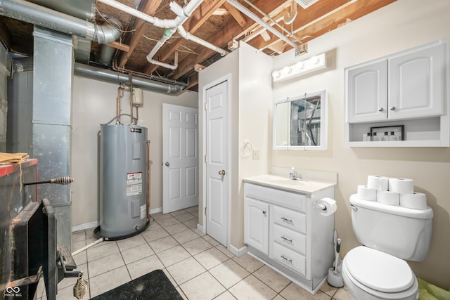 bathroom featuring vanity, tile patterned floors, water heater, and toilet