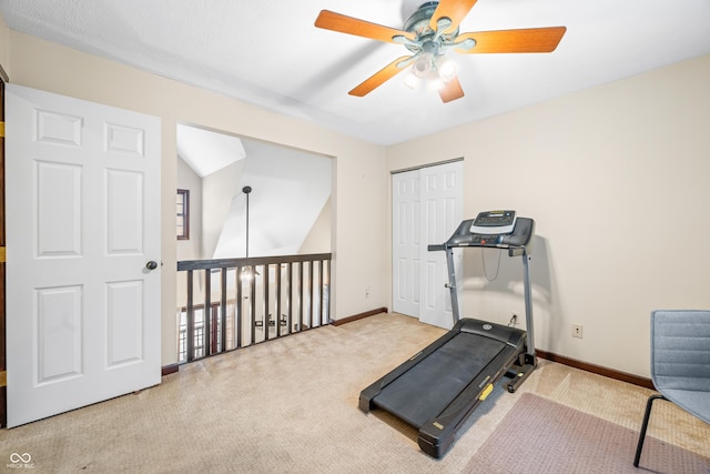 workout room featuring carpet floors and ceiling fan