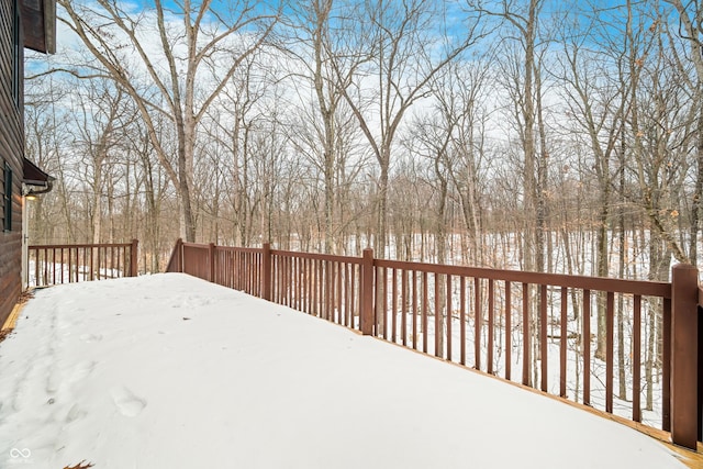 view of snow covered deck