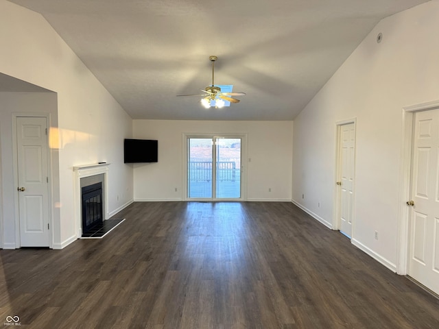 unfurnished living room with dark wood-type flooring, high vaulted ceiling, and ceiling fan