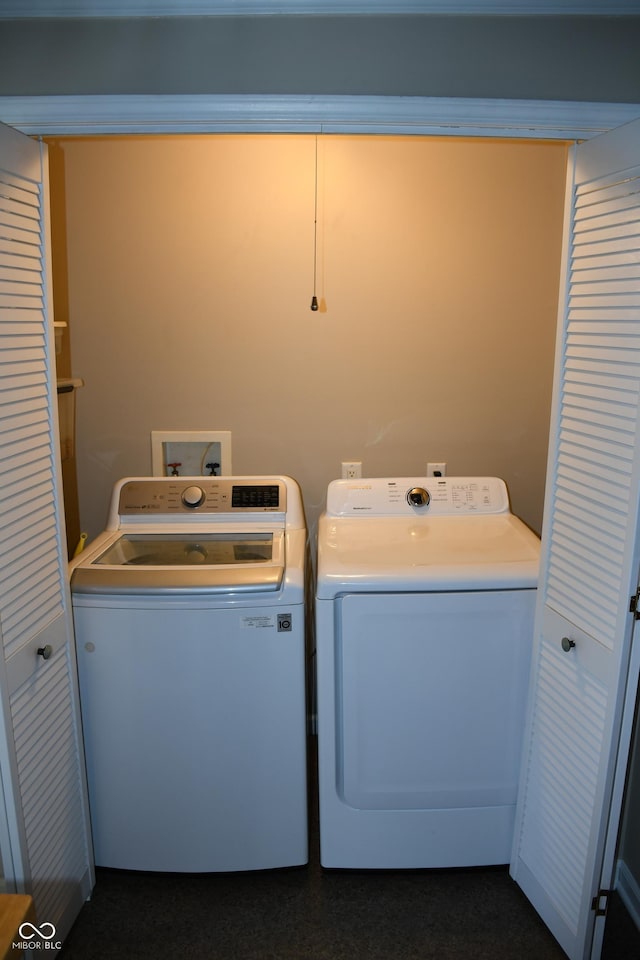 washroom with washer and clothes dryer