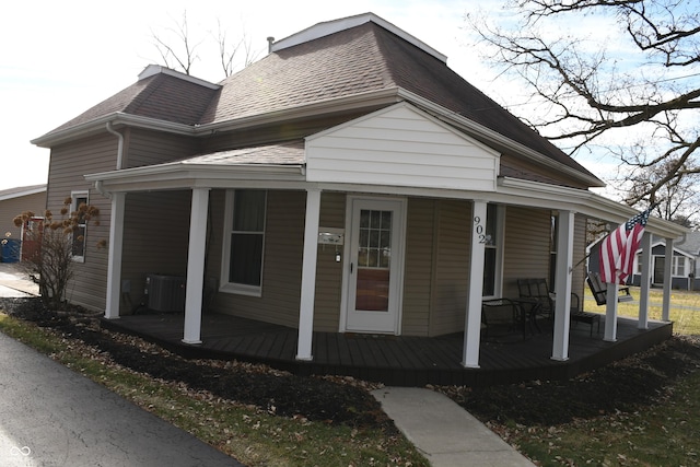 view of home's exterior featuring central AC and covered porch