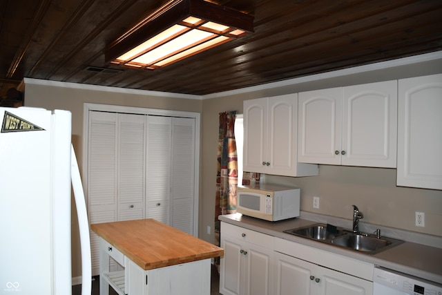 kitchen with sink, white appliances, wooden counters, white cabinetry, and wooden ceiling