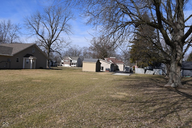 view of yard with a storage shed