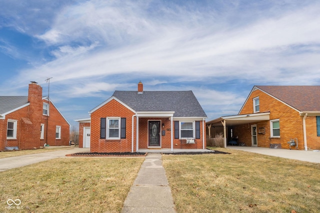 bungalow-style home featuring brick siding, roof with shingles, a chimney, concrete driveway, and a front yard