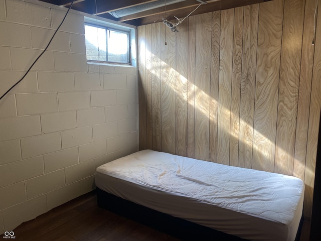 bedroom with dark wood-type flooring