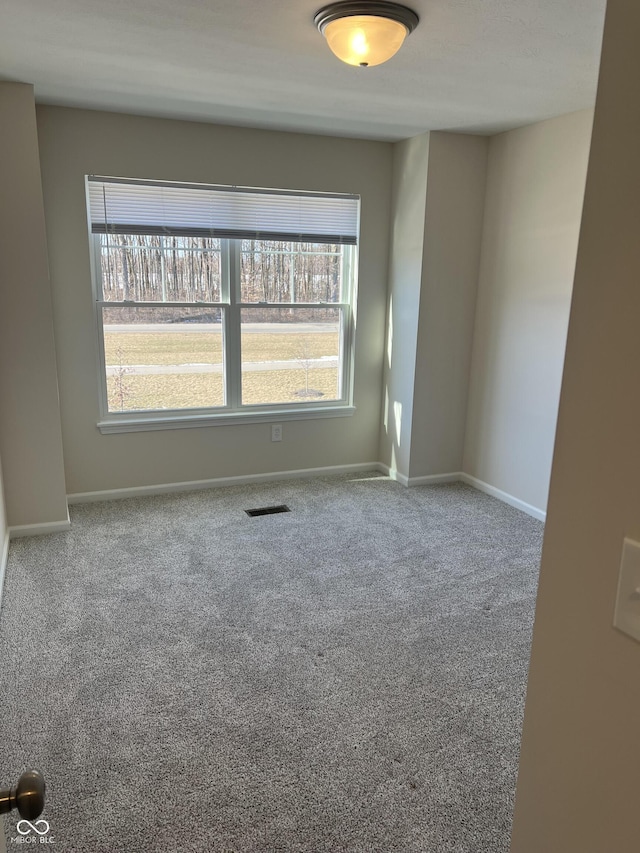 empty room with carpet floors