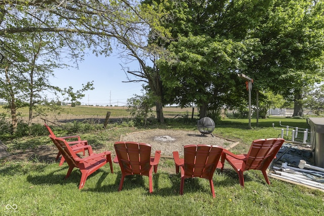 5750 W 300th Rd N, Bargersville, IN 46106 - view of grassy yard with an outdoor fire pit