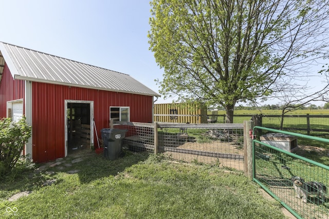5750 W 300th Rd N, Bargersville, IN 46106 - view of yard featuring an outbuilding, fence, a detached garage, and a gate