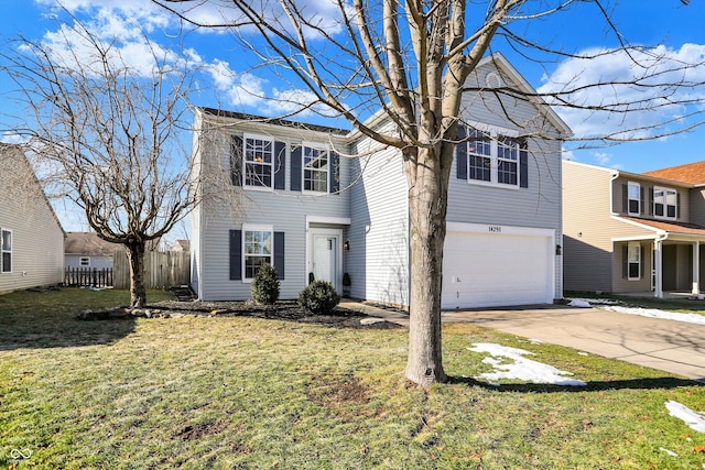 view of front of property featuring a garage and a front yard