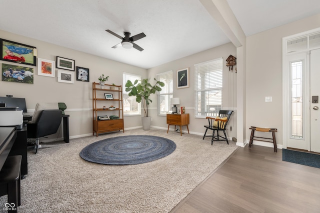 home office with hardwood / wood-style flooring, a healthy amount of sunlight, and ceiling fan