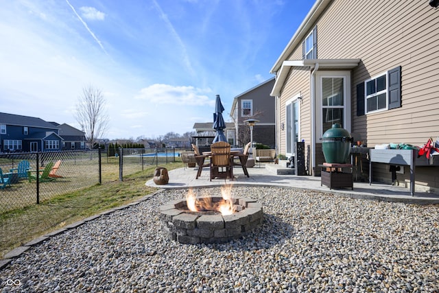 view of yard with a patio area and a fire pit