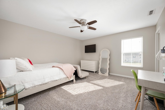 carpeted bedroom with ceiling fan