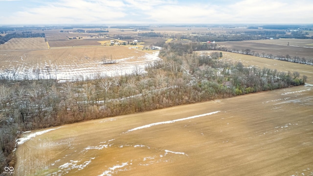 birds eye view of property with a rural view