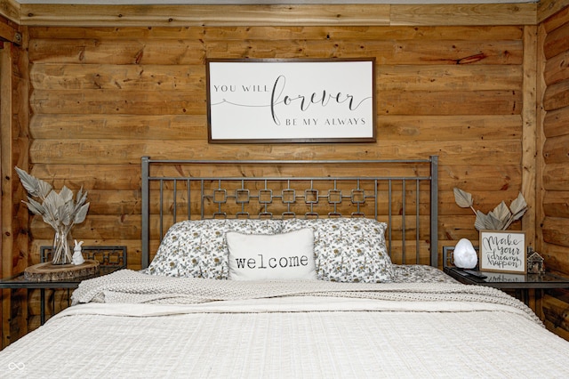 bedroom with log walls