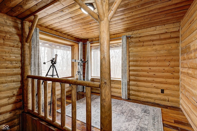 hallway with hardwood / wood-style floors and wood ceiling