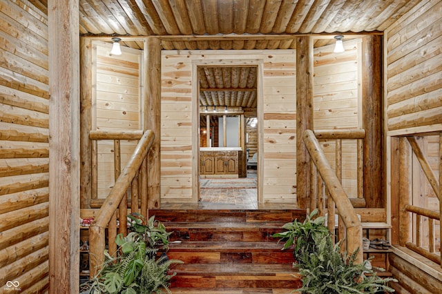 staircase featuring wooden ceiling