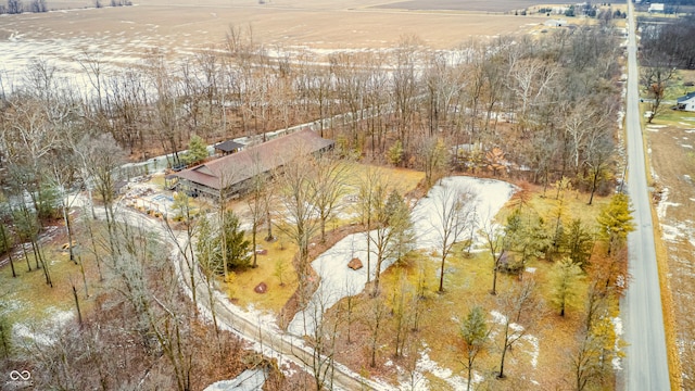 snowy aerial view with a rural view