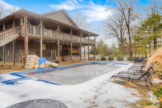 view of pool featuring a wooden deck