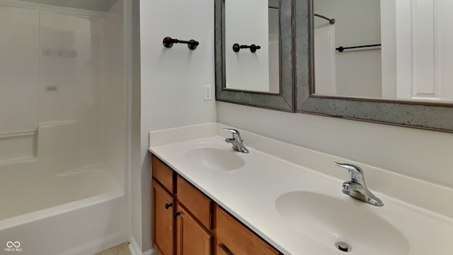 bathroom featuring vanity and shower / washtub combination