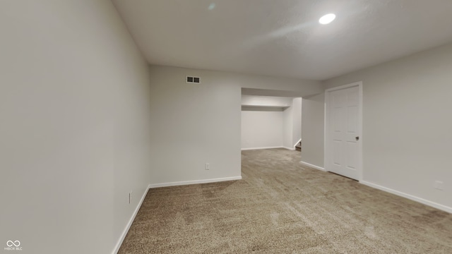 spare room featuring carpet flooring