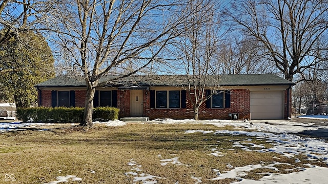 ranch-style home featuring a garage