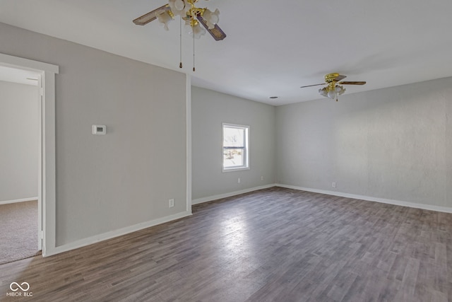 empty room featuring ceiling fan and hardwood / wood-style floors