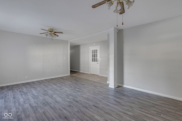 unfurnished room featuring wood-type flooring and ceiling fan