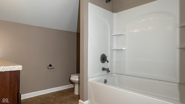 full bathroom with vanity, lofted ceiling, bathing tub / shower combination, and toilet