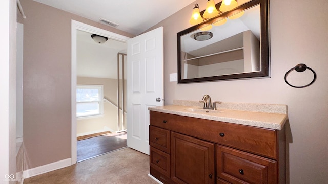 bathroom featuring vanity and walk in shower