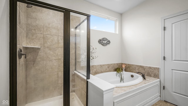 bathroom featuring plus walk in shower